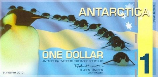 A 2010 Antarctica One Dollar private numismatic issue featuring Emperor penguins, highlighted as a classic example in our fantasy banknotes guide