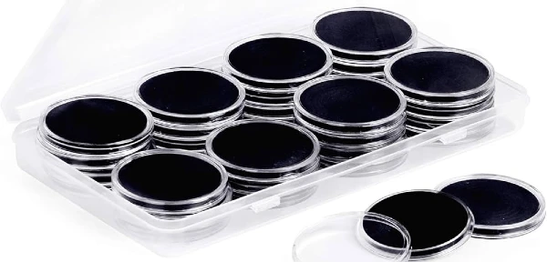Plastic coin capsules with black inserts for safe storage – coin preservation guide