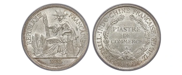 1885 French Indochina Piastre de Commerce silver coin showing obverse with seated Liberty figure and reverse with denomination inscription